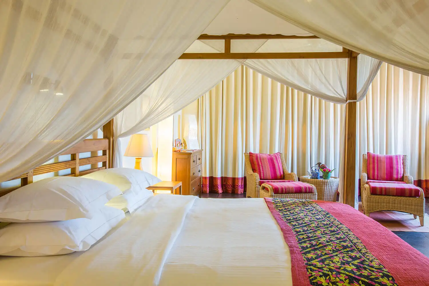 The Coral Suites romantic four-poster bed